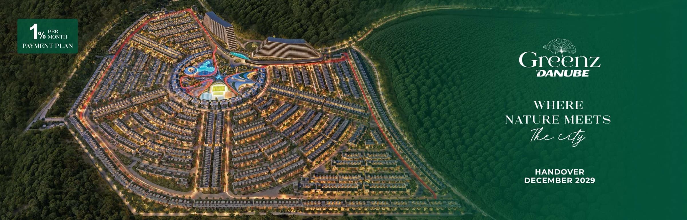 Danube Greenz — full masterplan aerial at dusk